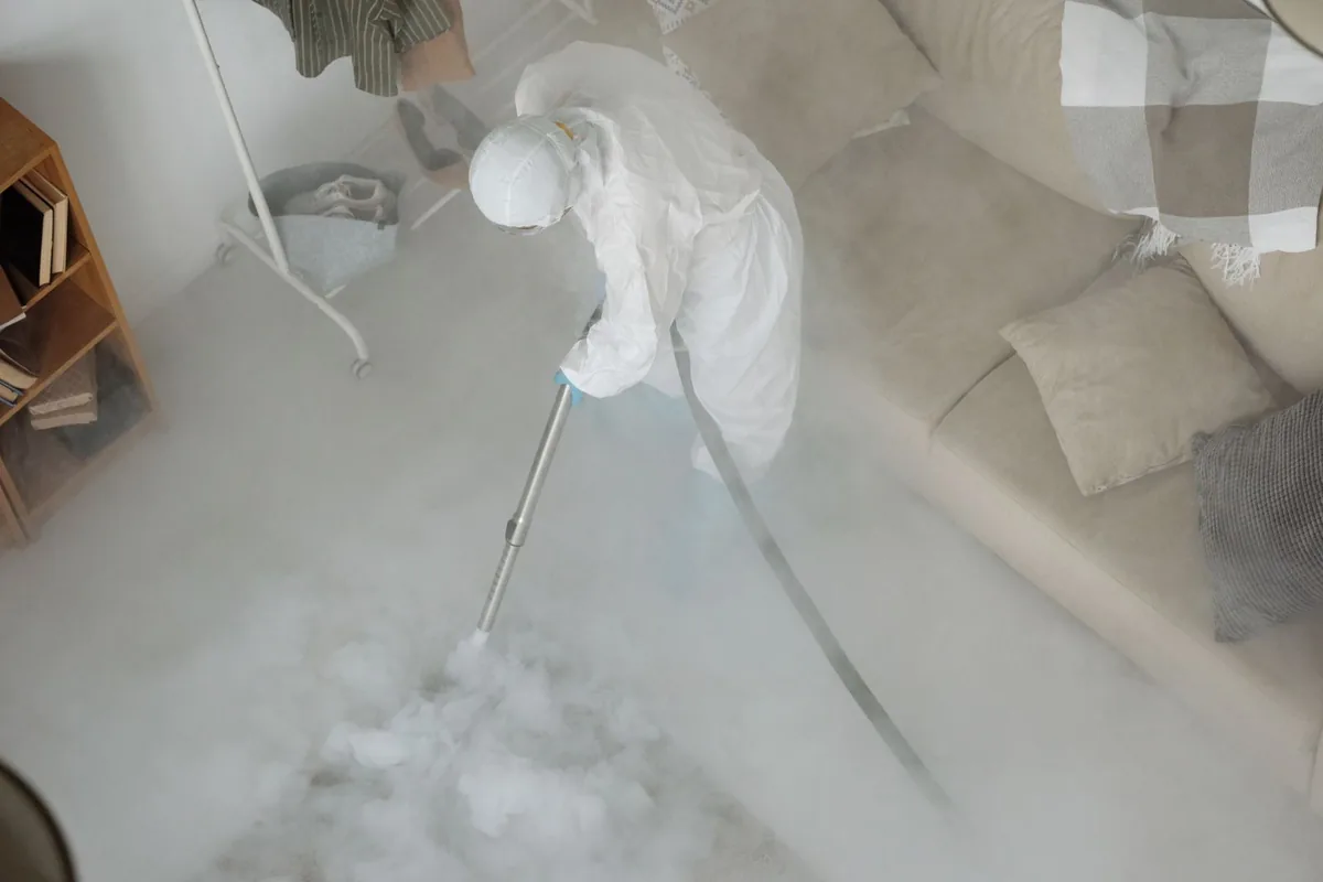 Biohazard cleanup technician in protective equipment, Ivins, UT